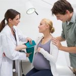Pregnant woman at doctor&#39;s appointment